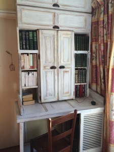 Bookcase of old wood, doors and window shutters